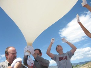 The FAST team fills a balloon prior to launch.
