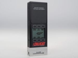 Alicat portable mass flowmeter, shown with standard monochrome display.