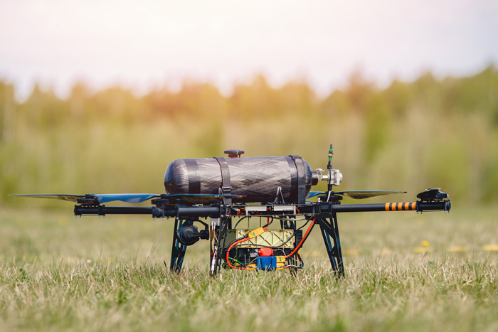 Hydrogen powered drone in a field