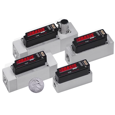 Small mass flow meters and controllers by Alicat with quarter for comparison. High performance in a small footprint.