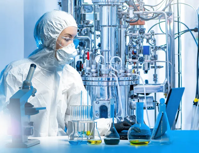 Photo of a scientist inside a pharmaceutical facility