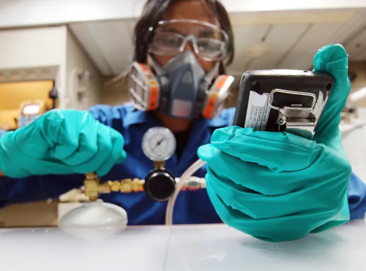 Photo of a scientist working in a metrology lab