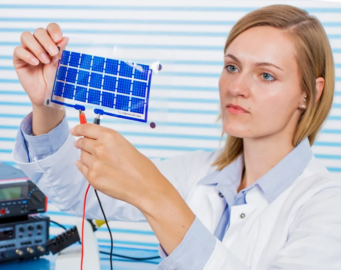 Photo of an engineer in a thin film deposition lab
