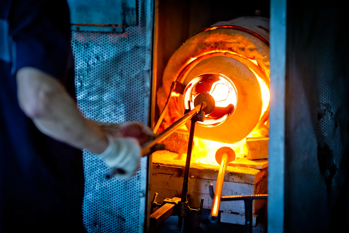 Photo of an engineer inspecting refrigeration equipment