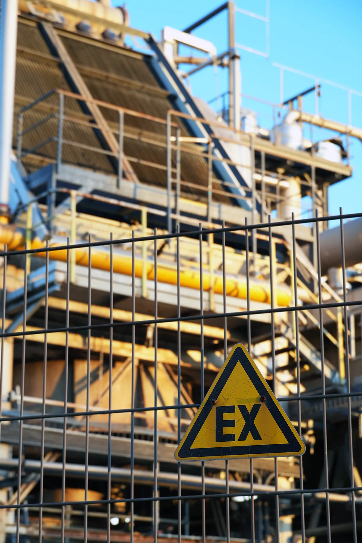 Danger warning sign on a fence at a Group A explosive gas facility